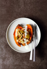 a dish of Sweet potato, baked in the oven, and Hummus with green