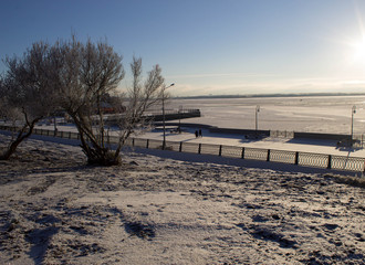 landscape of snow-covered embankment
