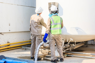 Technician fill with liquid nitrogen with Nitrogen storage tank at new factory