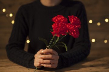 Women are receiving carnations on Mother's Day