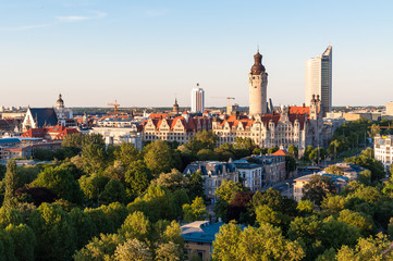 panoramic skyline of Leipzig with townhall and high court at sunset, Germany - obrazy, fototapety, plakaty