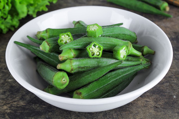 fresh whole and slice organic green okra, healthy vegetable