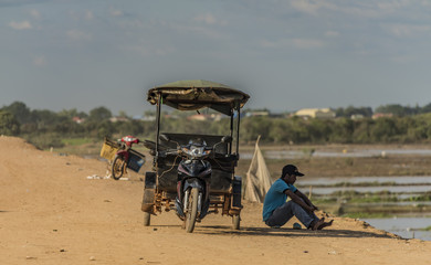 People in street and countryside in Siem Reap