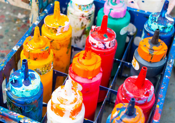 colorful bottles in plastic case