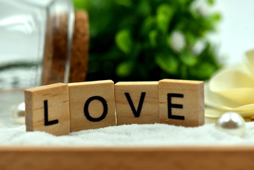 Romantic Love Wood Blocks are on the White Sands