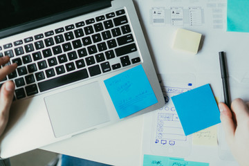 Overhead view of a busy desk