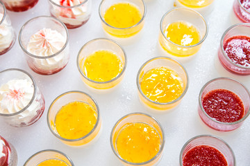 Color jelly fruit pudding recipes sweet dessert cocktail dinner prepare to serve in glass cup at the hotel.