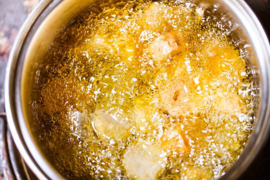 Food Cooking Deep Frying On Hot Oil.