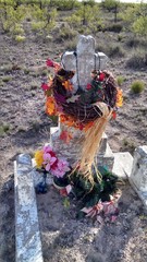 Cross Headstone with a Flowery Wreath