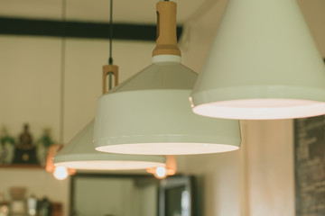 Obraz premium cafe decoration closeup hang lighting interior design of coffee shop.