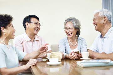 Obraz na płótnie Canvas senior asian people having a good time