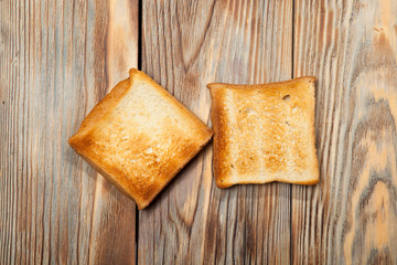 Toast on a rustic wooden background