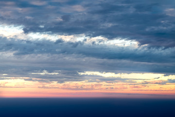 View sunset with sky and cloudy from airplane window when flying