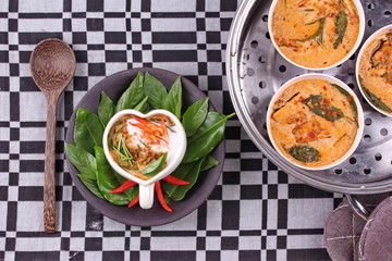 Streamed fish curry in Heart-shaped cup .