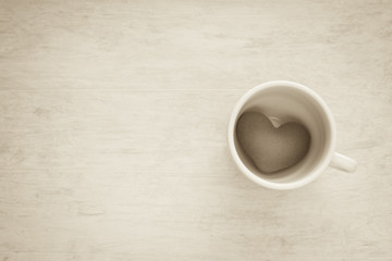 Heart in coffee cup, vintage tone style