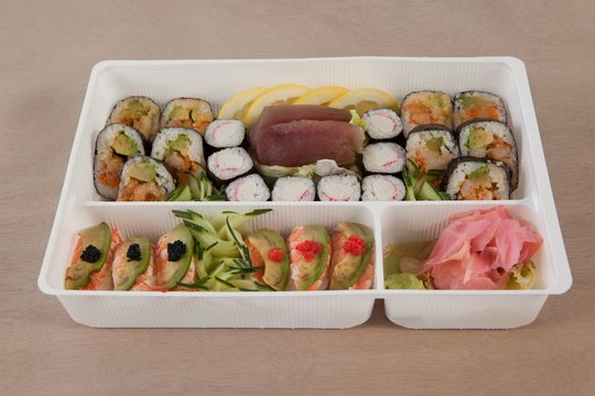 Set of assorted sushi kept in a white box