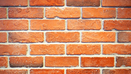 Red brick wall.