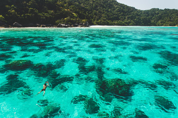 Fototapeta na wymiar Sea bay with clear emerald water. Paradise holidays on islands