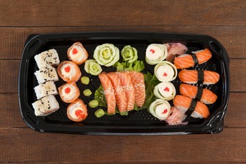 Set of assorted sushi served in a black box