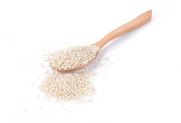 Fototapeta na wymiar white sesame seeds in spoon on white background