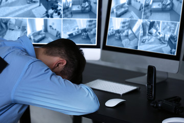 Fototapeta premium Safety of private property and modern technology. Safeguard sleeping at work