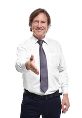 Confident man stretching out hand for shaking, on white background