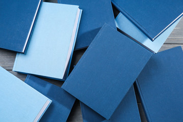 Blue hardcover books background