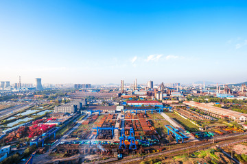 constructions of steel factory in blue sky