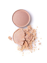 Round crashed beige eyeshadow for make up as sample of cosmetics product