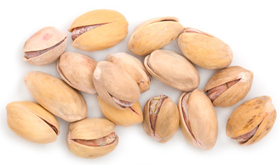 Salted pistachios on white background