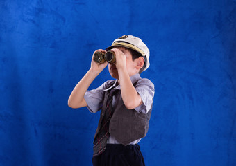 studio portrait of a boy ship's captain