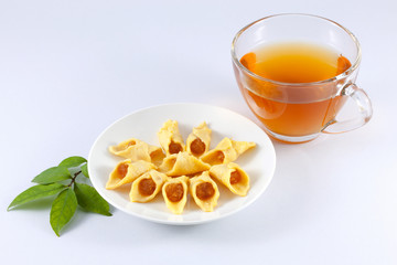 Pineapple pie with tea isolated on white background