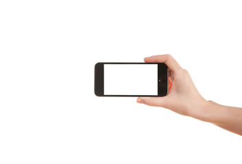 Hand girl holding a mobile phone on a white background
