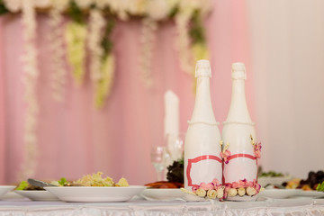 Wedding decorated champagne bottles