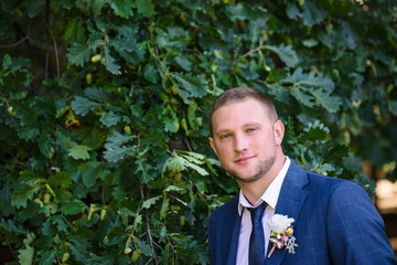 a groom outdoors
