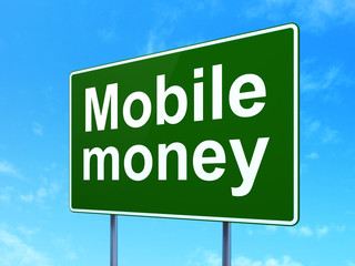 Currency concept: Mobile Money on road sign background