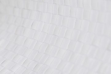 Weisser Hintergrund / Abstrakter weisser Hintergrund mit Textur und geringer Tiefenschaerfe.