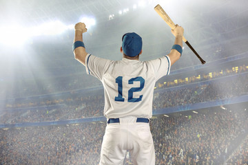 Baseball players in action on the stadium.