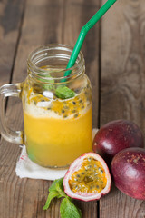 Passion fruit smoothie in mug.