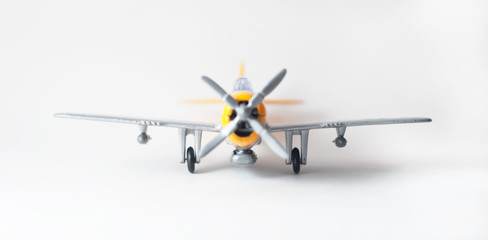 Close up of a toy plane on white background,