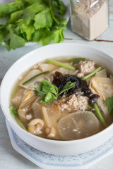 Tofu soup with chopped pork.