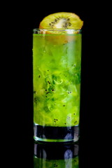 cold drink with kiwi on black background