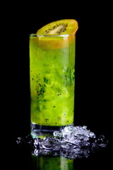 cold drink with kiwi on black background