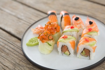 Set of assorted sushi served on plate