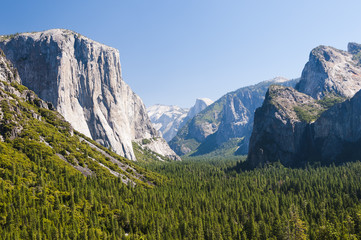 Fototapeta premium View of famous Yosemite Valley with Half-dome in hot summer day.