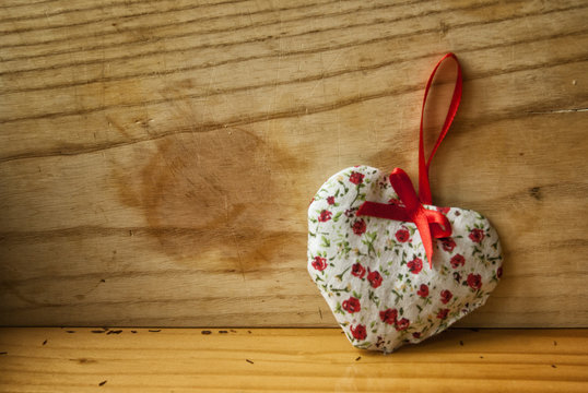 Valentine's heart on wooden background