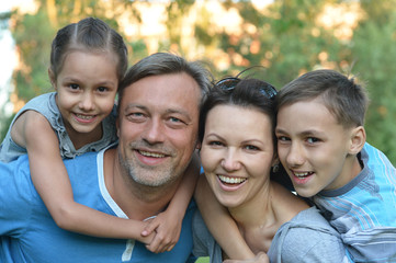 Family resting in  summer park