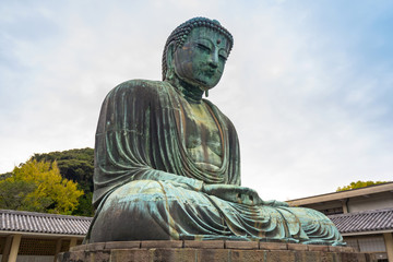 Fototapeta na wymiar Monumental bronze statue of the Great Buddha in Kamakura, Japan.