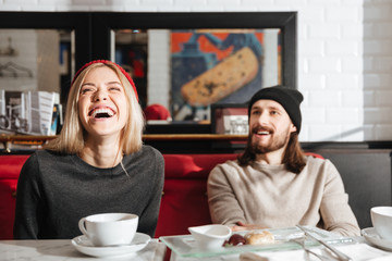 Laughing woman with her boyfriend
