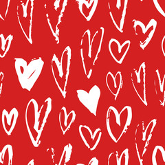 Hand drawn paint seamless pattern. Red and white vector hearts background. Abstract brush drawing